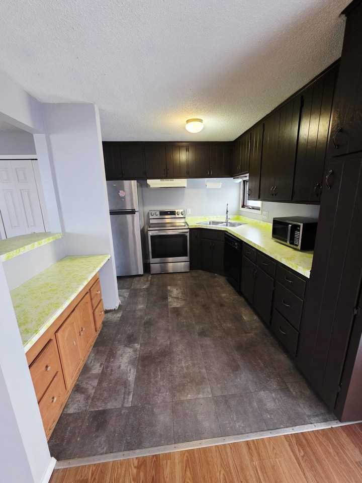 8425 Brunswick Ave N #1 - Photo 7 of 18