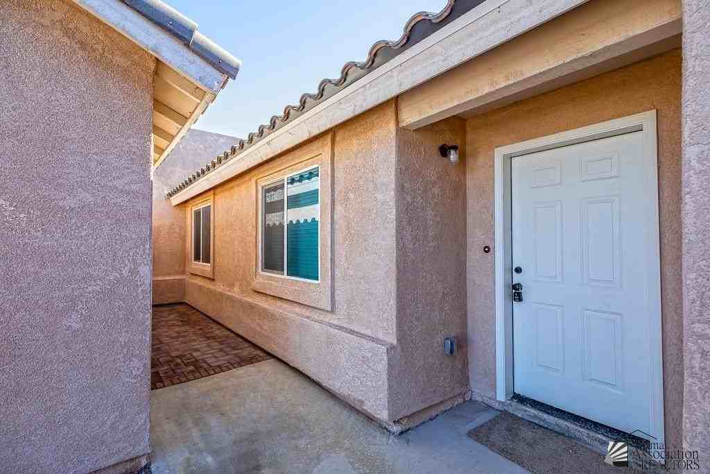 7171 E 38th Ln - Photo 2 of 20