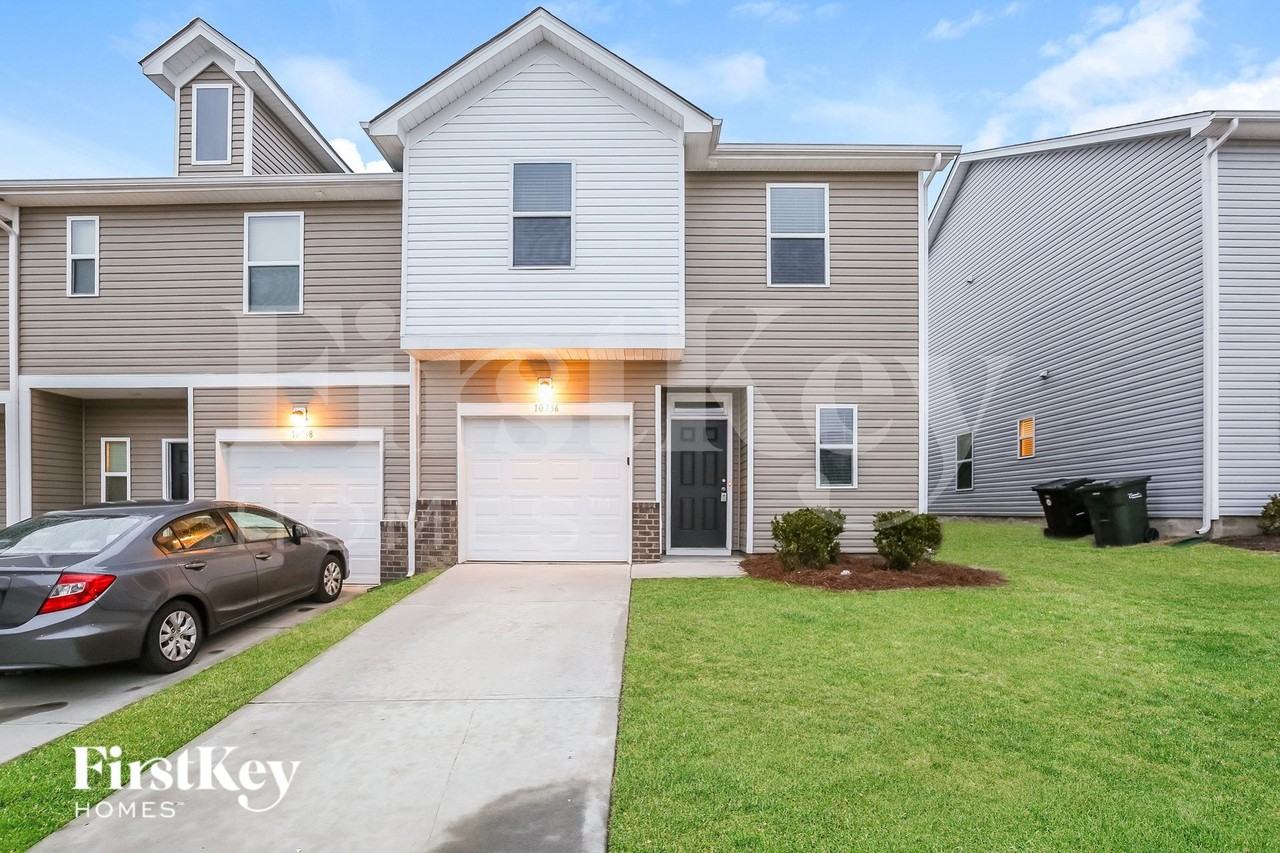 10736 Rivergate Dr NW - Photo 2 of 16