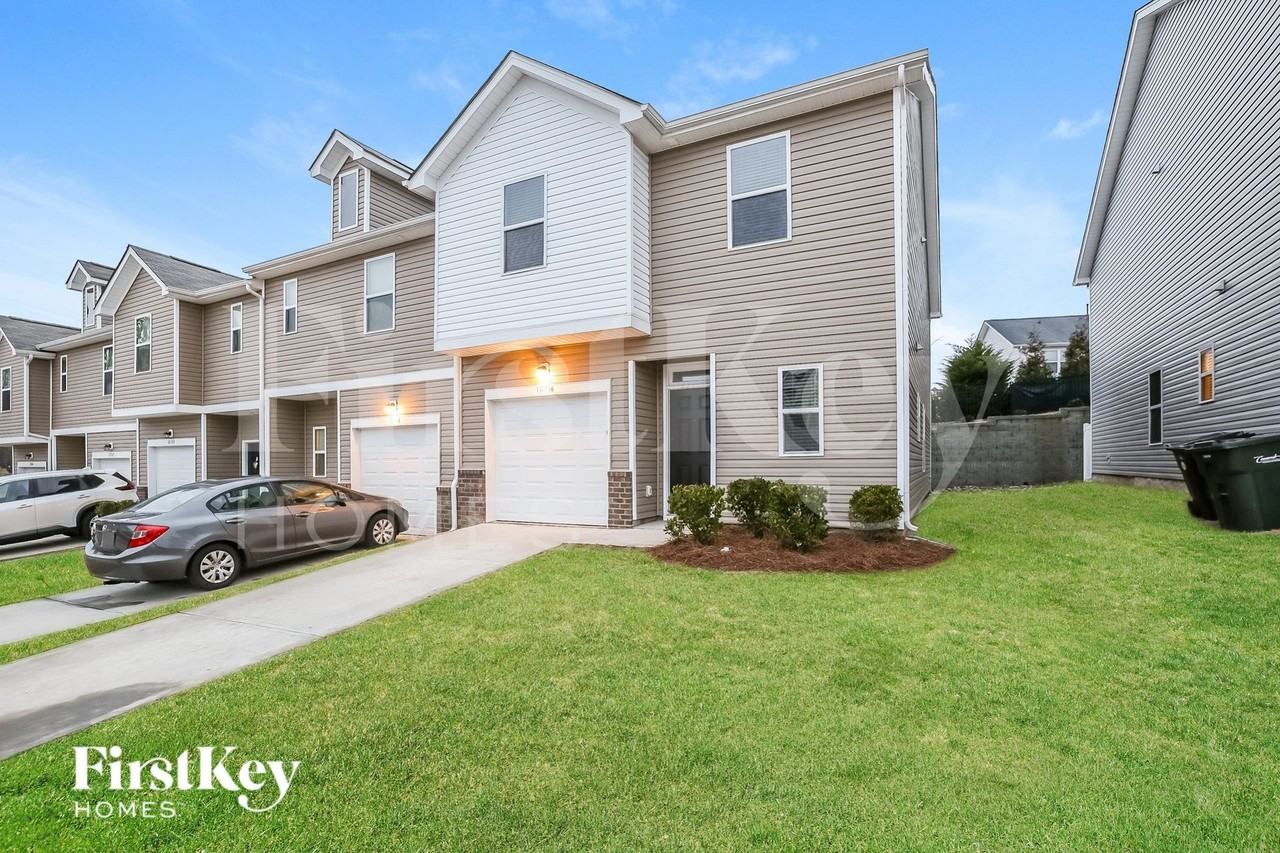 10736 Rivergate Dr NW - Photo 3 of 16