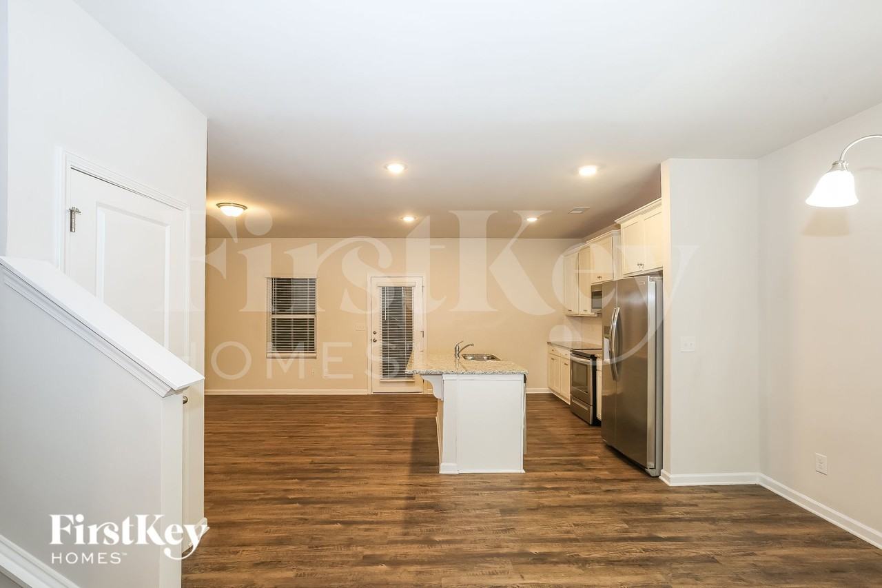 10736 Rivergate Dr NW - Photo 5 of 16