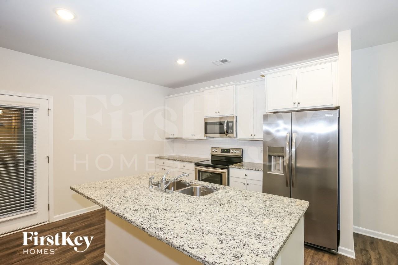 10736 Rivergate Dr NW - Photo 7 of 16