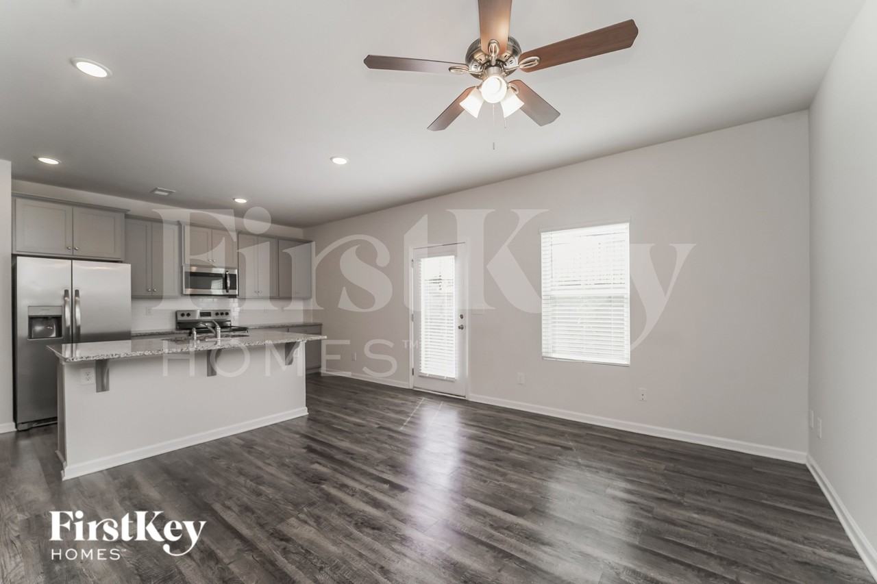 10714 Rivergate Dr NW - Photo 4 of 16