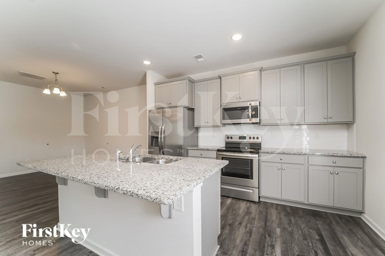 10714 Rivergate Dr NW - Photo 6 of 16