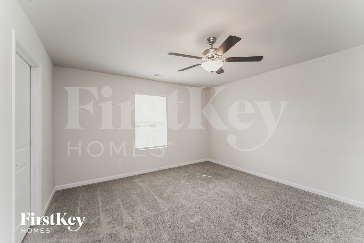 10714 Rivergate Dr NW - Photo 7 of 16