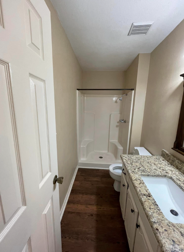 Azalea Court Duplexes - Photo 7 of 8