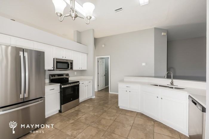 1128 Vinetree Dr - Photo 7 of 12