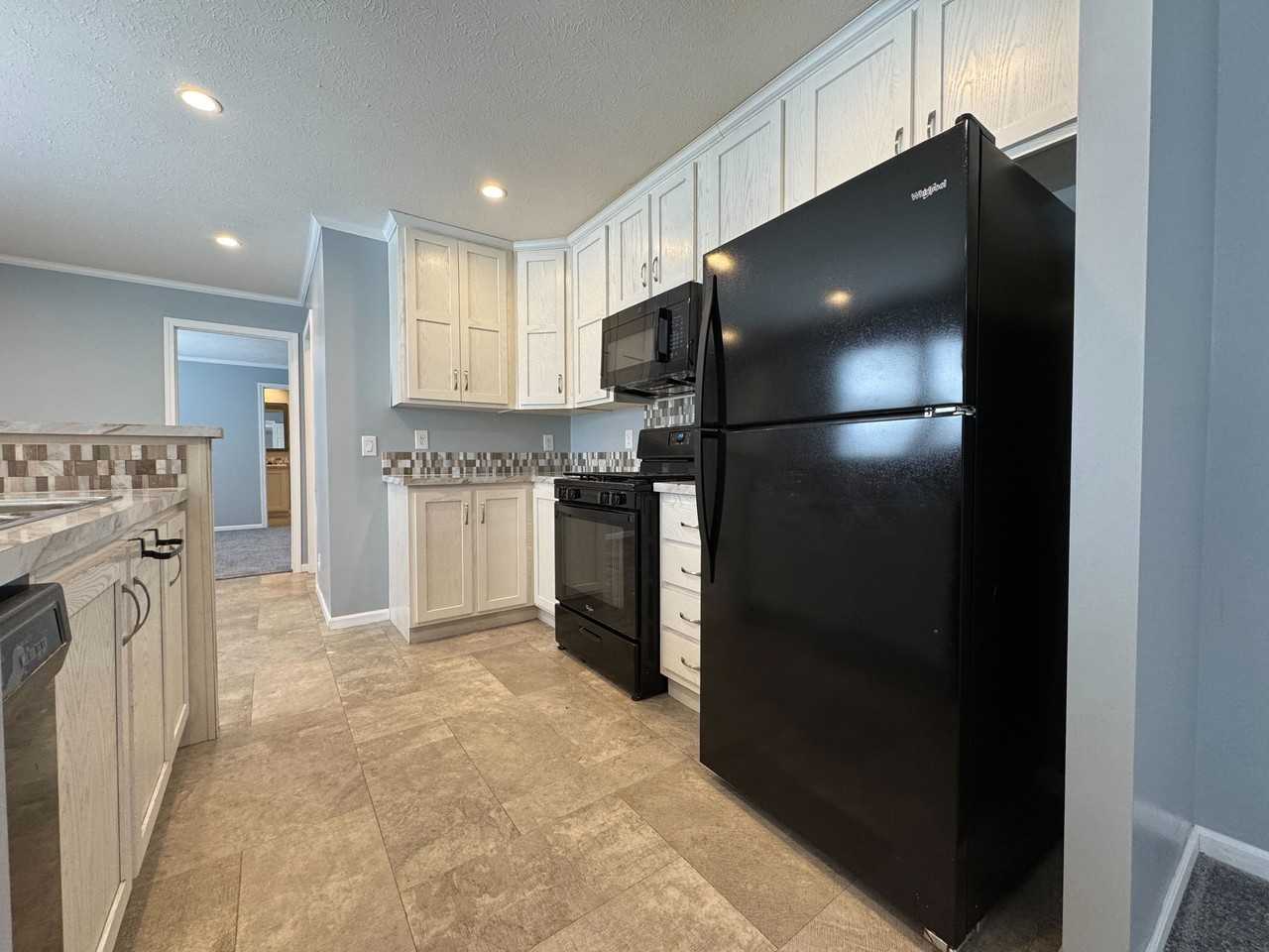 2112 Bluebird Terrace Northwest #98 - Photo 5 of 23