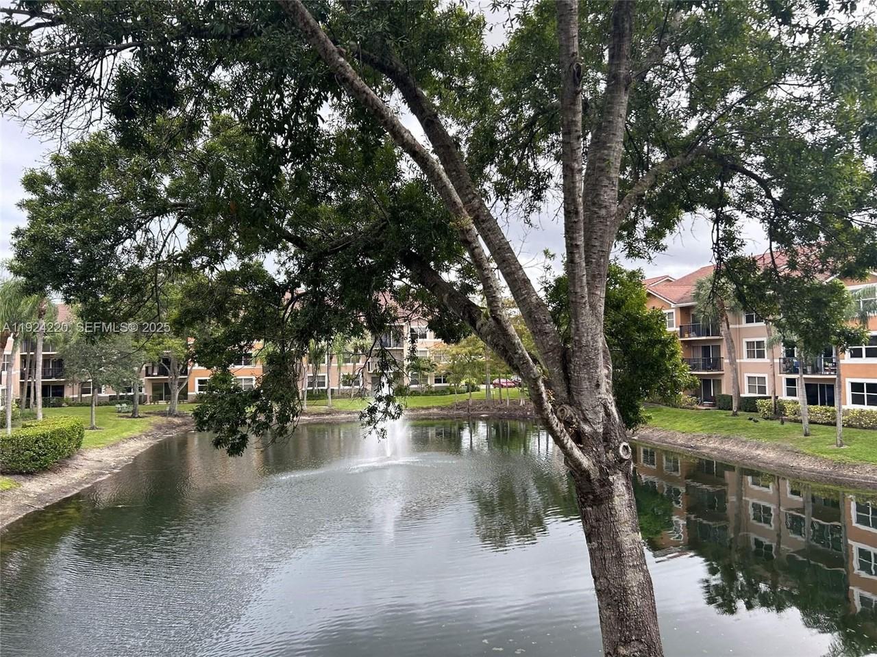 8977 Wiles Rd #8977-208 - Photo 3 of 28