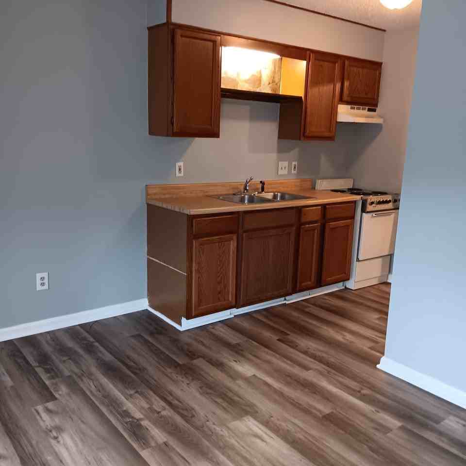 TIMBERLINE APARTMENTS - Photo 2 of 12