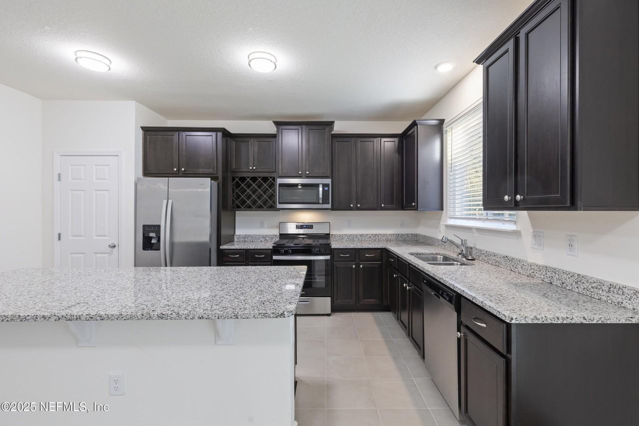 11006 Stapleton Dr - Photo 5 of 24