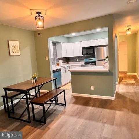 10133 Prince Pl Apt 102-12c #102-12C - Photo 3 of 14