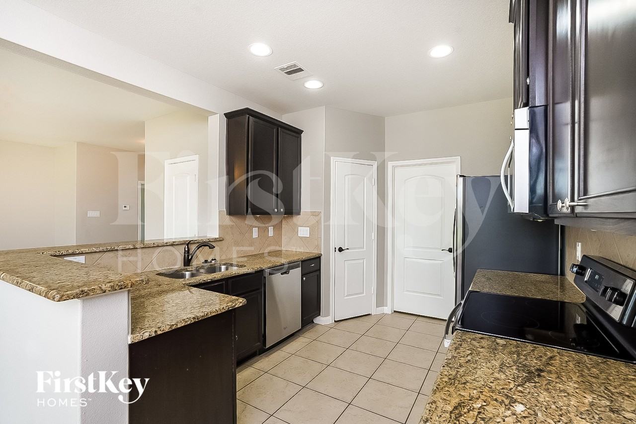 22630 August Crow Dr - Photo 6 of 16