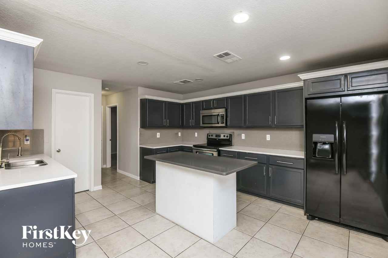 5600 Ainsdale Dr - Photo 6 of 15