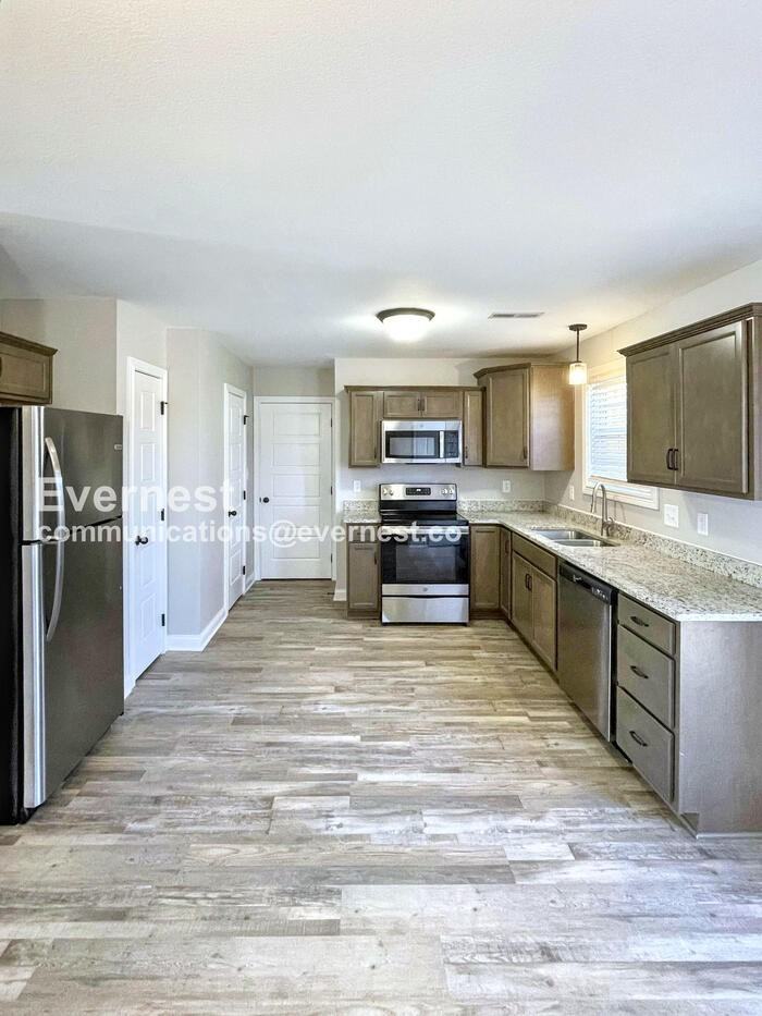 1101 Cardinal Creek Dr - Photo 3 of 27