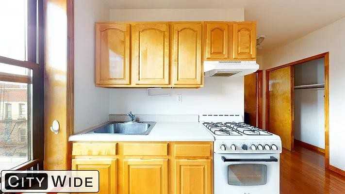 East 14th Street #34 - Photo 4 of 13