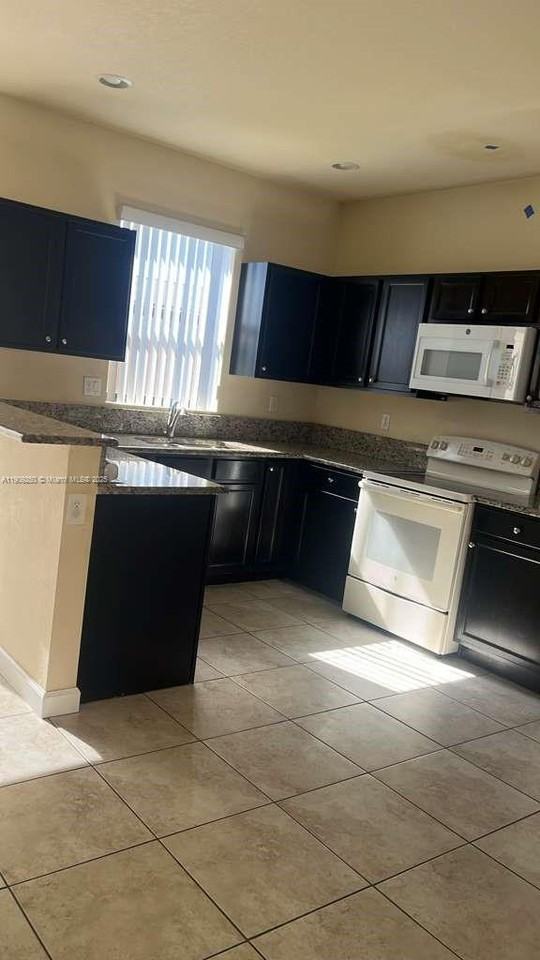 23848 Southwest 117th Place - Photo 3 of 6