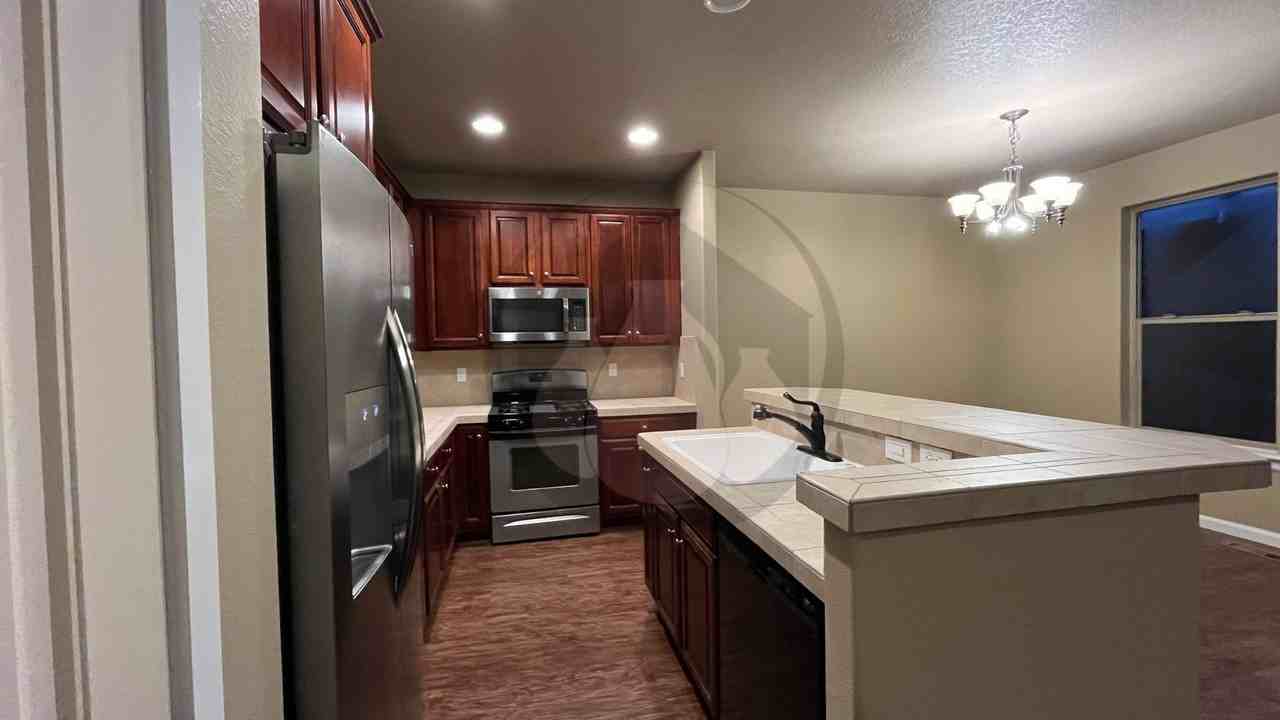 841 Crouchen St Nw - Photo 2 of 5