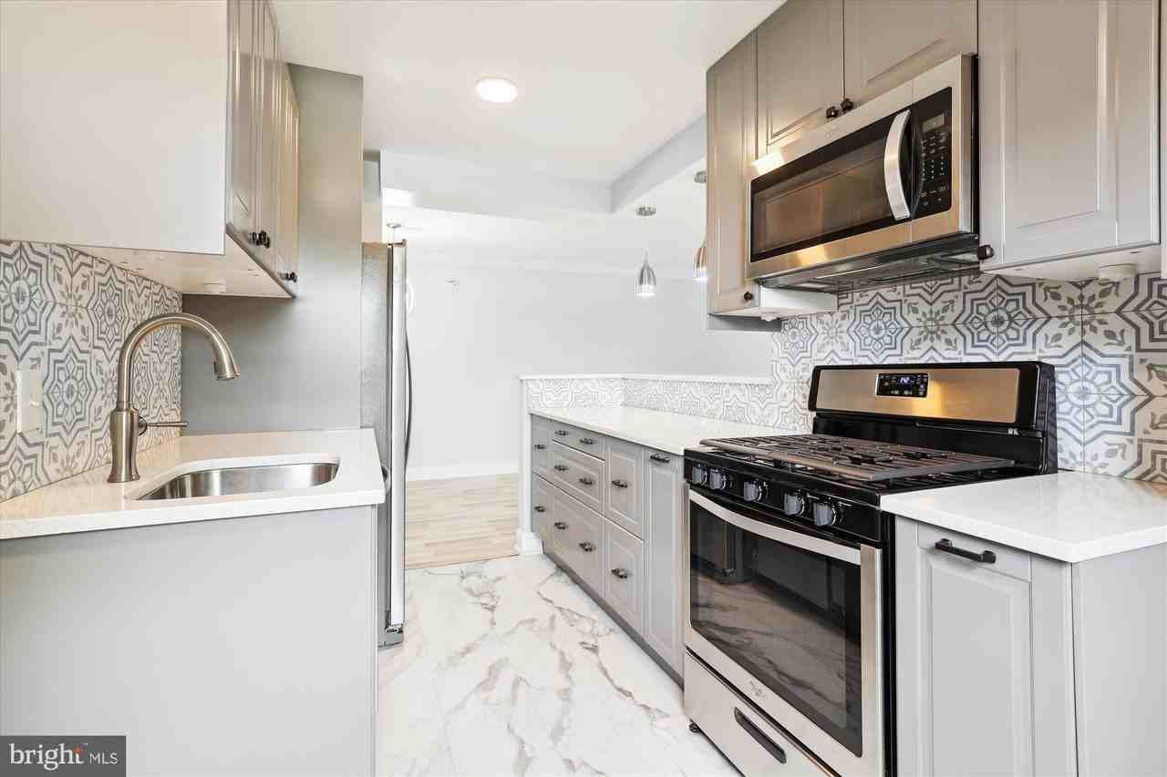 5909 Quantrell Avenue #203 - Photo 4 of 33