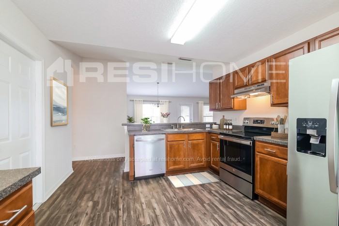 8723 Fort Socrum Village Pl - Photo 2 of 16