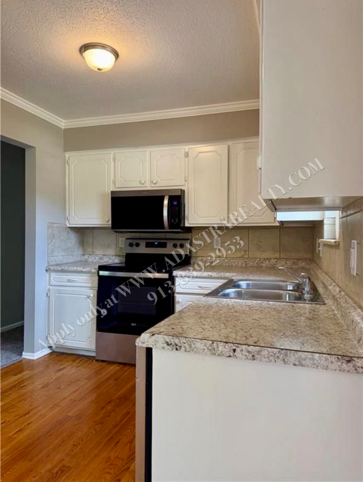 7718 East 90th Terrace - Photo 6 of 13