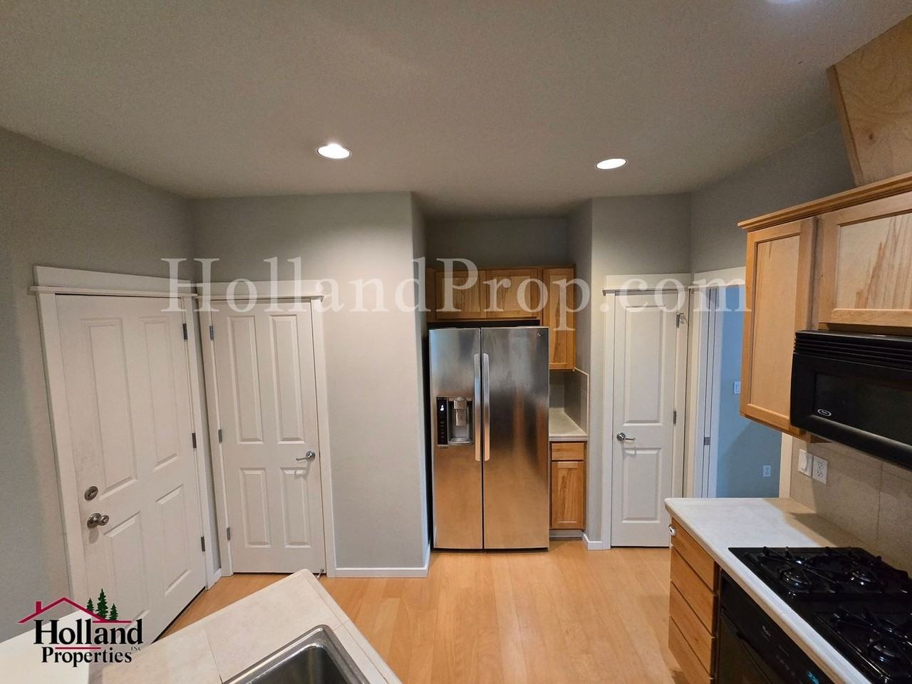 7135 Northeast Stonewater Street - Photo 2 of 18