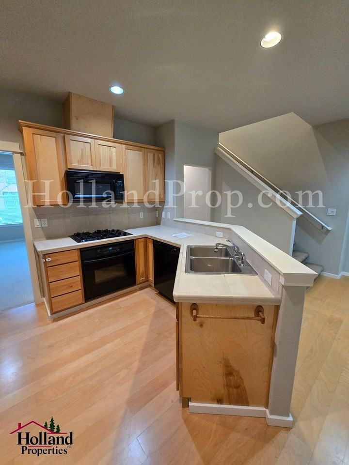 7135 Northeast Stonewater Street - Photo 3 of 18