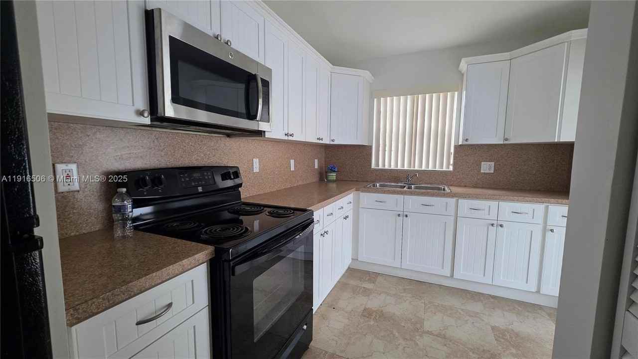 9818 Southwest 146th Court #9818 - Photo 2 of 18