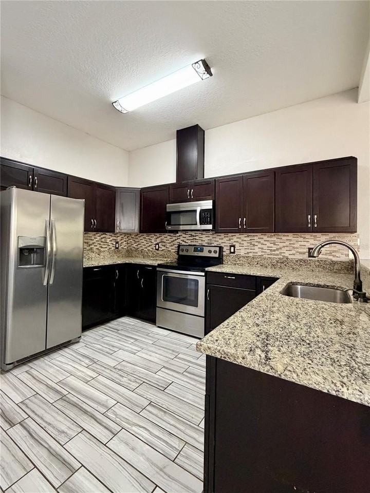 4848 Tampa Downs Blvd - Photo 2 of 27