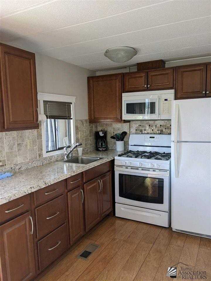 13827 East 49th Lane #A - Photo 4 of 8