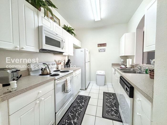 8107 Coconut Palm Way #202 - Photo 4 of 19