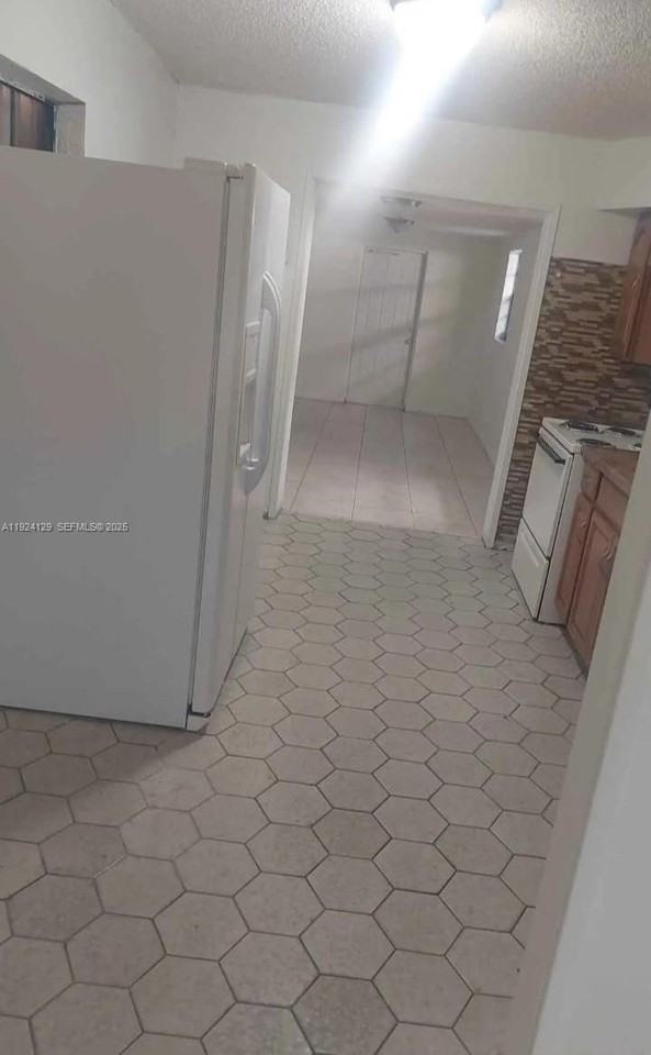 561 East 62nd Street #561-1 - Photo 3 of 4