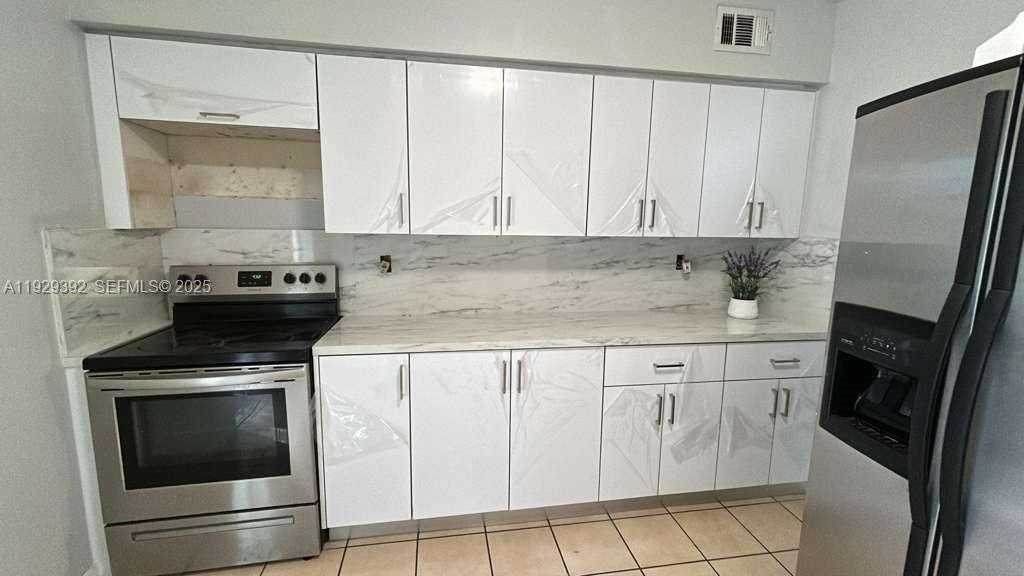 9463 Southwest 174th Street #9463 - Photo 3 of 13