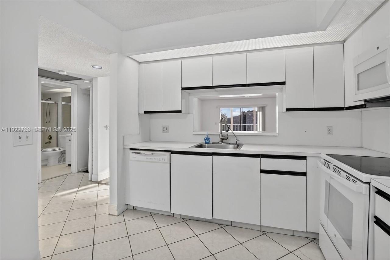 900 Southwest 128th Avenue #306D - Photo 4 of 33