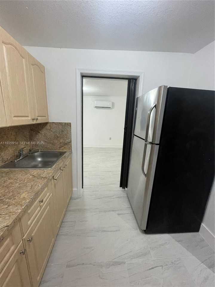 4455 Northwest 169th Terrace #1 - Photo 6 of 10