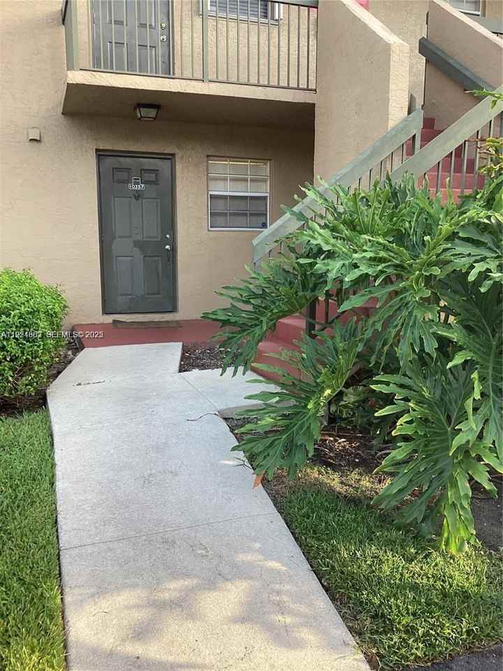 10357 Nw 8th St #10357-105 - Photo 2 of 4