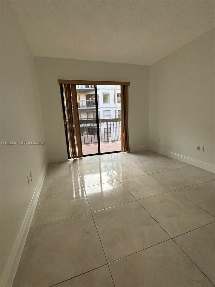 8810 Southwest 132nd Place #8810203DN - Photo 2 of 11