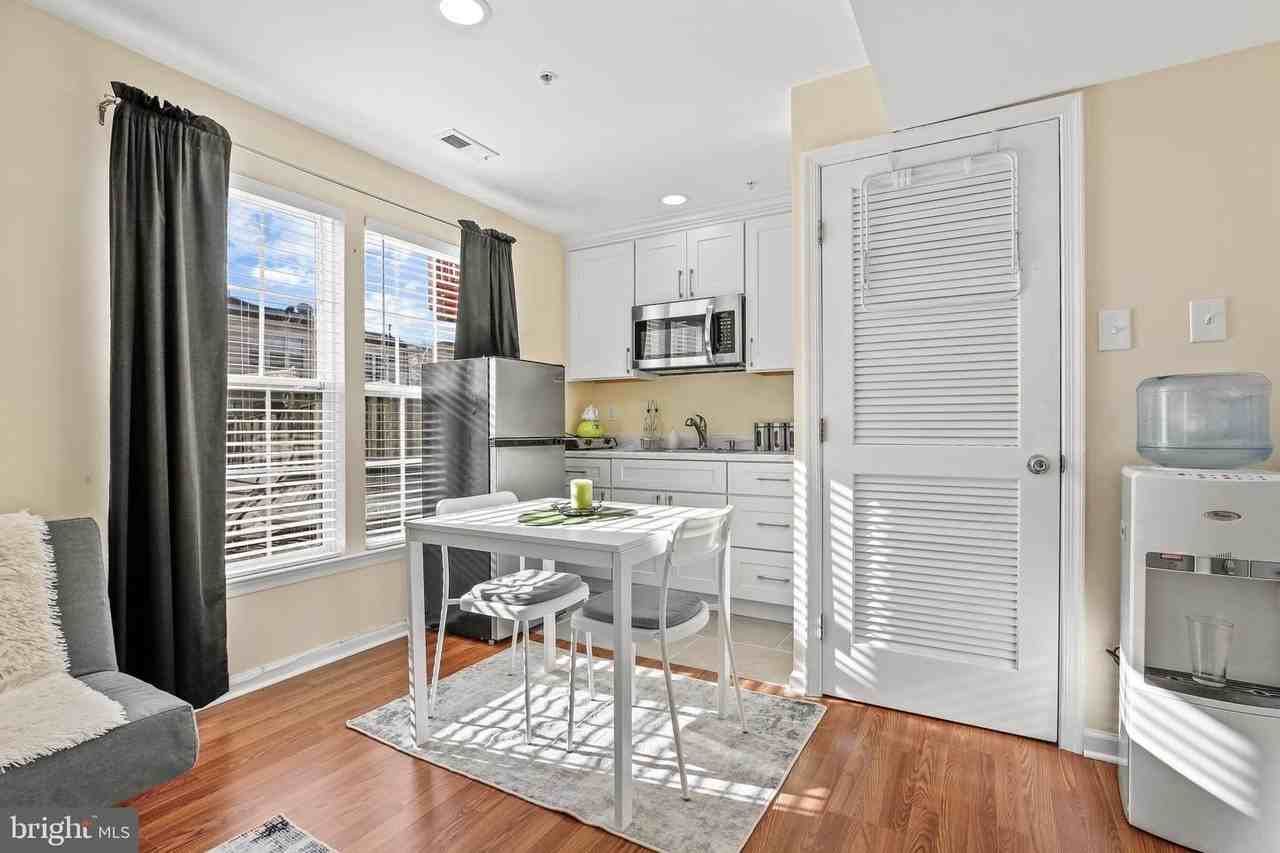 13011 13011 BASEMENT APARTMENT VADEN TER #214 - Photo 2 of 15