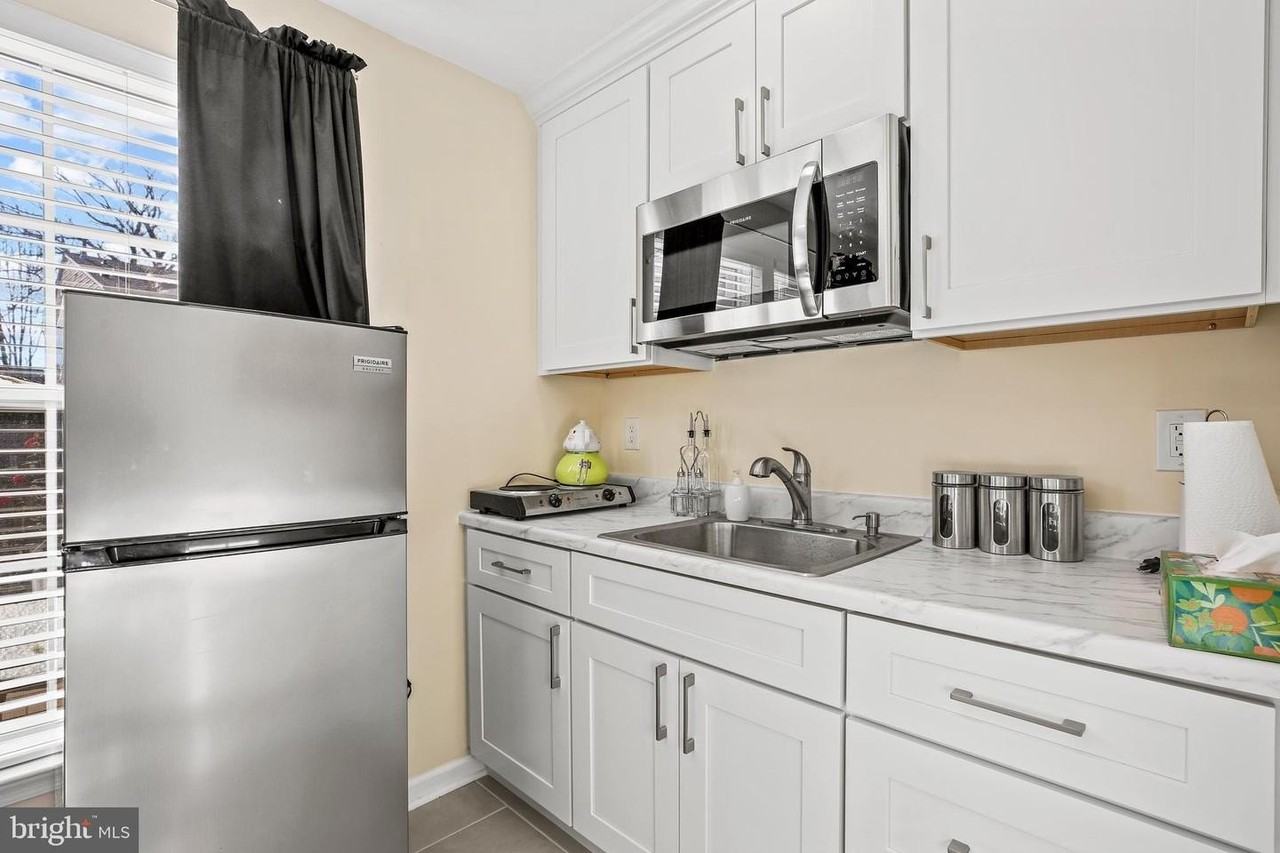 13011 13011 BASEMENT APARTMENT VADEN TER #214 - Photo 3 of 15