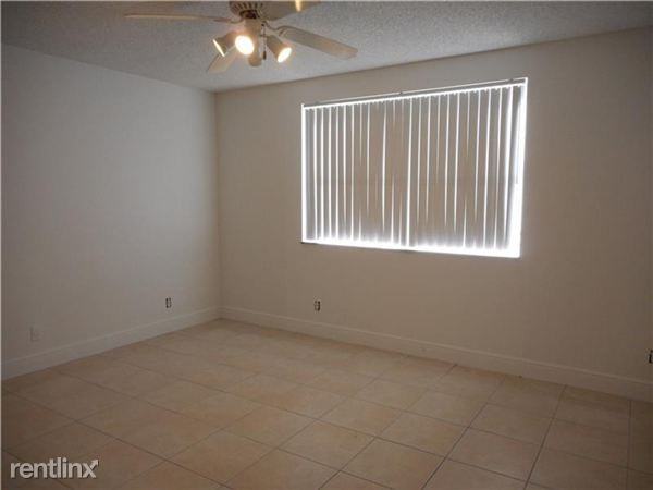 8977 Wiles Rd - Photo 2 of 6