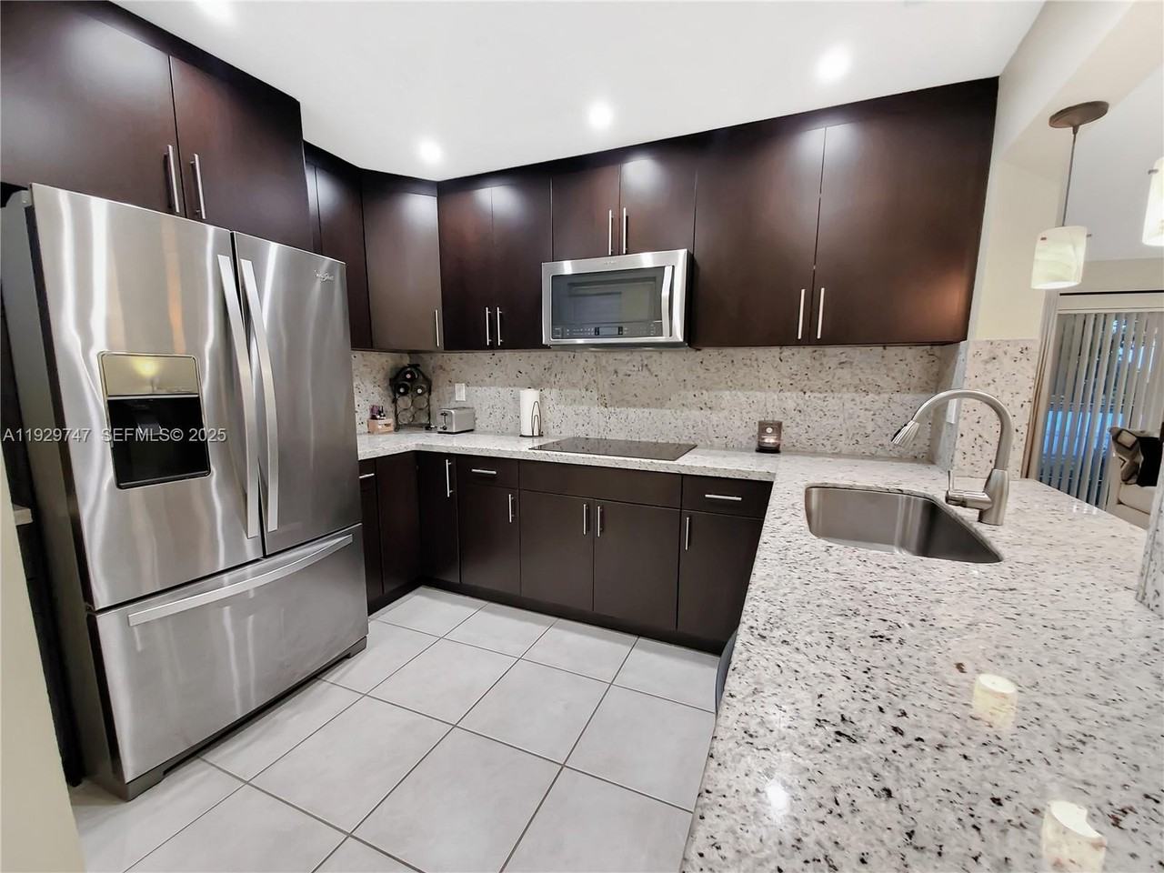 15701 Southwest 137th Avenue #202 - Photo 4 of 24