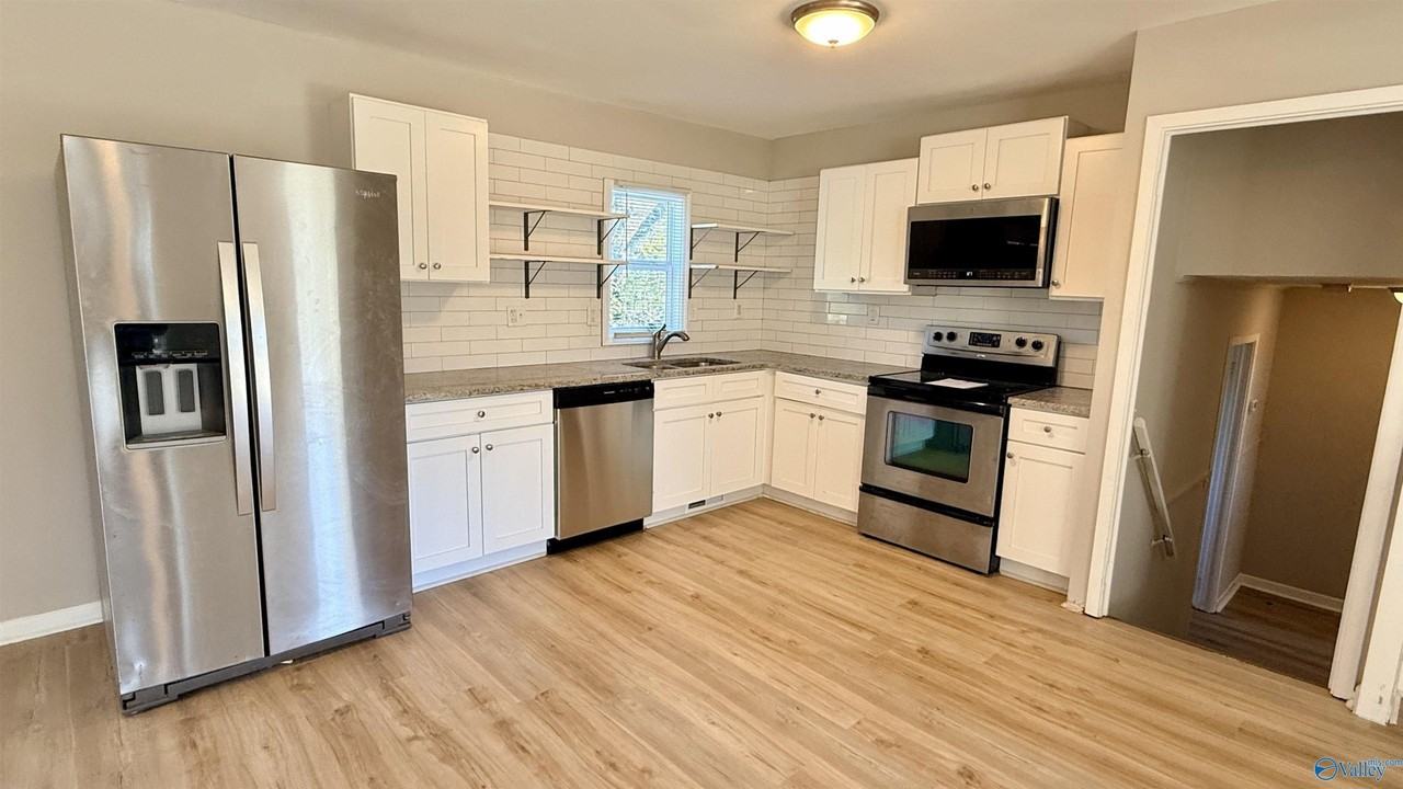 2004 Chambers Dr Ne - Photo 7 of 32