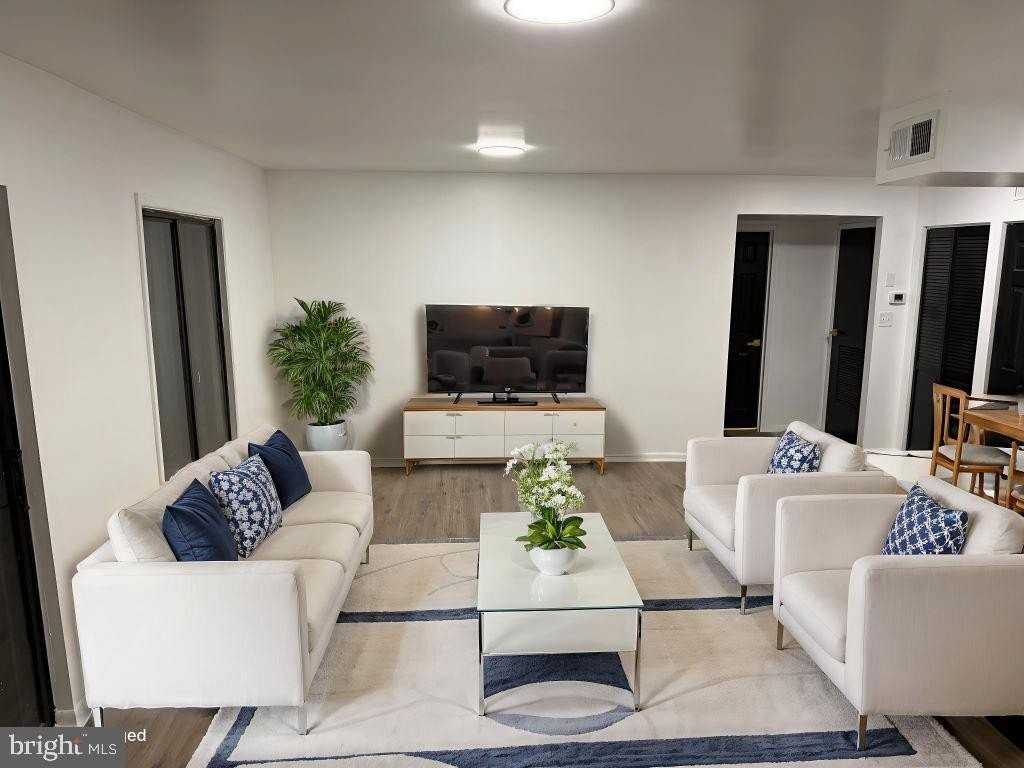 6982 Hanover Pkwy Apt 203 #203 - Photo 2 of 12