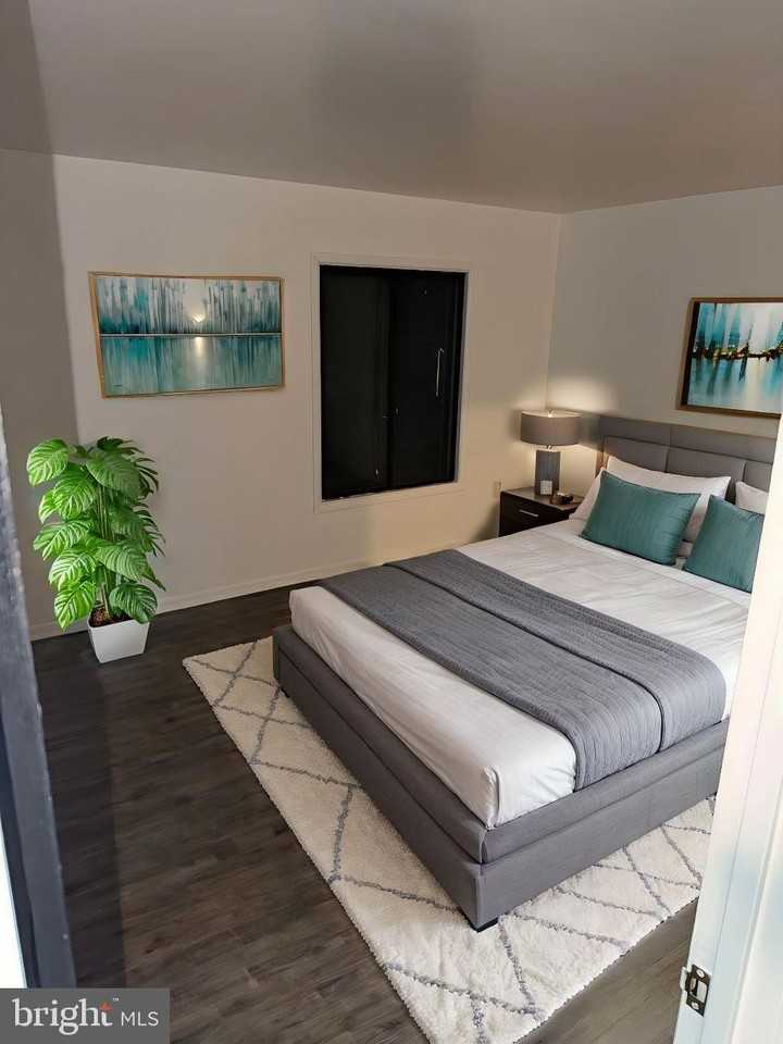 6982 Hanover Pkwy Apt 203 #203 - Photo 3 of 12