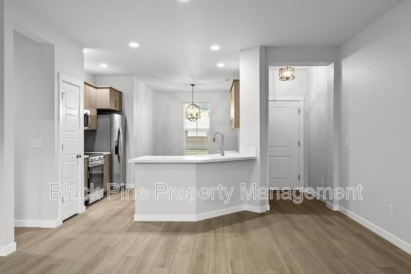 895 North Aleppo Way - Photo 4 of 31