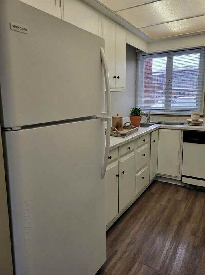 Come home to Highland North Townhomes! - Photo 3 of 13