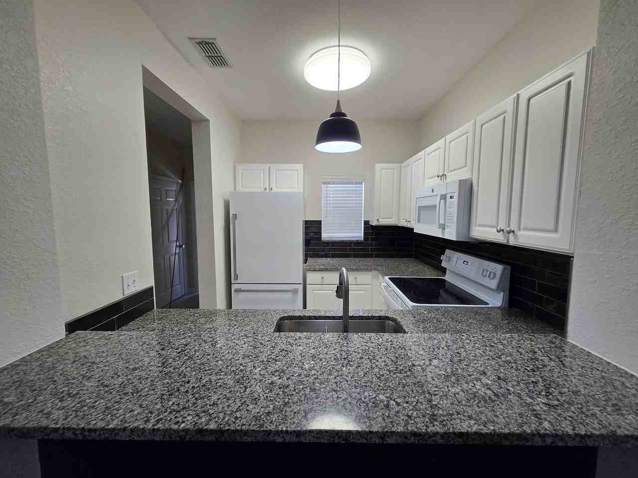 4551 Northwest 49th Street #104 - Photo 6 of 37