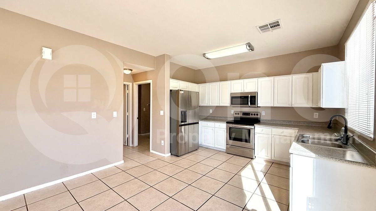 1945 N 103rd Dr - Photo 4 of 26