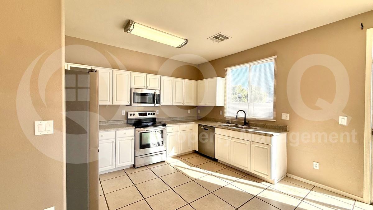 1945 N 103rd Dr - Photo 5 of 26