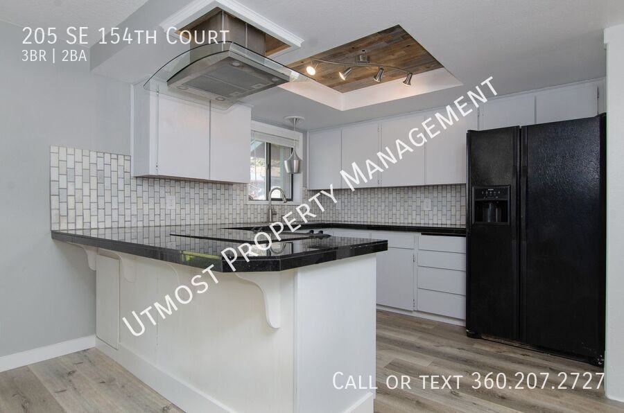 205 Southeast 154th Court - Photo 3 of 12